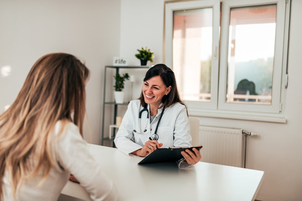 Doctor consulting a patient.